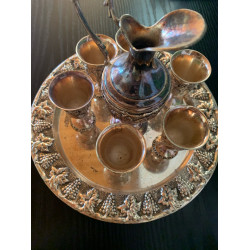 Bronze mug antique with 6 small glasses