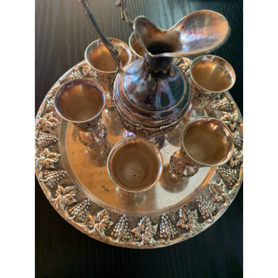Bronze mug antique with 6 small glasses